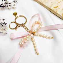Load image into Gallery viewer, Ameliorate Crystals' Signature: Freshwater Pearls Ribbon Bow Signature Crystal Keychain