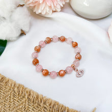 Load image into Gallery viewer, Orange Sunstone x Rose Quartz Crystal Bracelet (Rose Gold Evil Eye)
