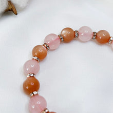 Load image into Gallery viewer, Orange Sunstone x Rose Quartz Crystal Bracelet (Rose Gold Evil Eye)
